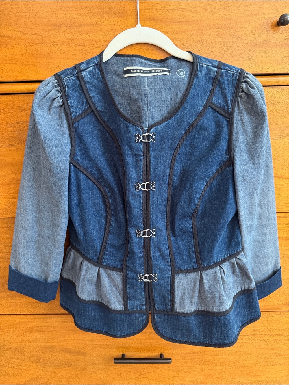 Two-Tone Blue Denim Peplum Jacket with Decorative Hooks